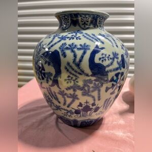 Blue and White Ceramic vase featuring Koi.  Pre owned.  8 1/2 inches tall.